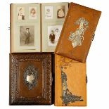 4 De Luxe Leather Photograph Albums With decorative mounts, tooled and embossed, 20 x 34 cm and 28 x