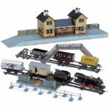 Bing Train Set with Station Building and further Accessories, c. 1930 1) Railway station with many