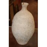 A Cretan Pottery Jar with an ovoid body and shaped pointed neck. 30 cm high.