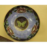 A Maling bowl, decorated with flowers and butterfly, marked to base, 24cm in diameter