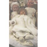 Three German dolls to include one stamped Armand Marseille together with some clothing