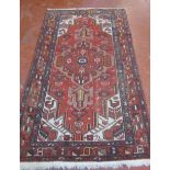 A Hamadan carpet 106 x 200cm