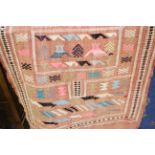 Three Moroccan rugs with stylized decoration