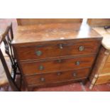 A Georgian mahogany and line inlaid chest with three long drawers on splayed legs 89cm wide