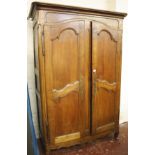 A French provincial 18th Century fruitwood armoire 208cm high, 140cm wide