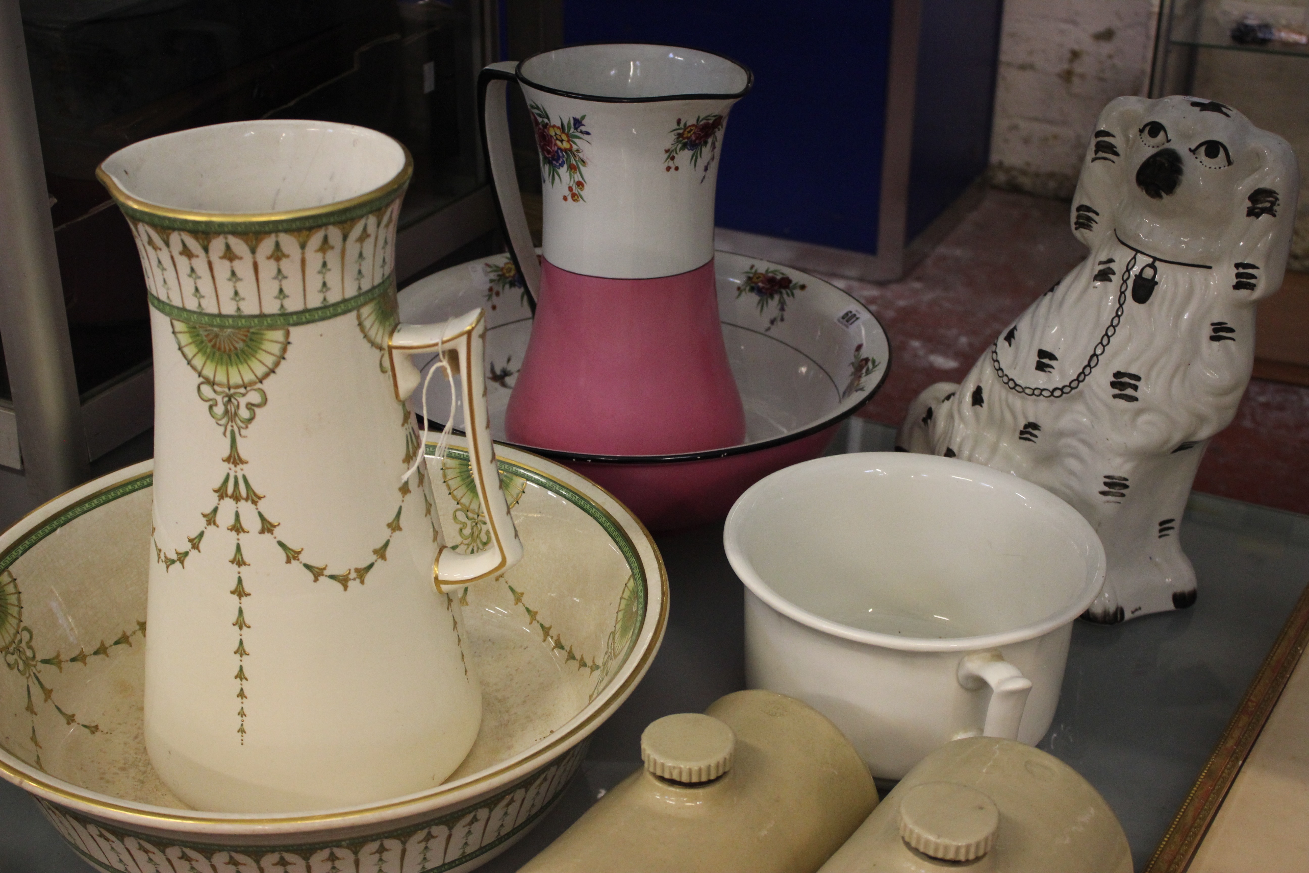 A quantity of mixed ceramics; wash jugs and basins etc