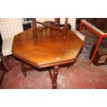 An Edwardian mahogany octagonal table and another similar smaller example