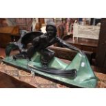 A Large Italian Art Deco Painted Plaster Figural Group by Pecchioli - female skier, pursued by an