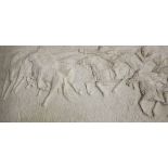 A carved relief plaque of horsemen, framed, 28cm x 66cm, 60cm x 100cm (including frame)