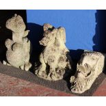 Three garden ornament gargoyles