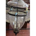 A pair of modern glass hanging lanterns 60cm high