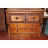 A 19th Century oak and pollard oak chest with two deep short and three long drawers flanked by
