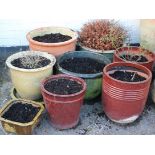 A mixed group of glazed garden pots