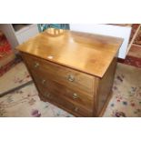 A 20th Century mahogany chest with three long drawers 84cm wide