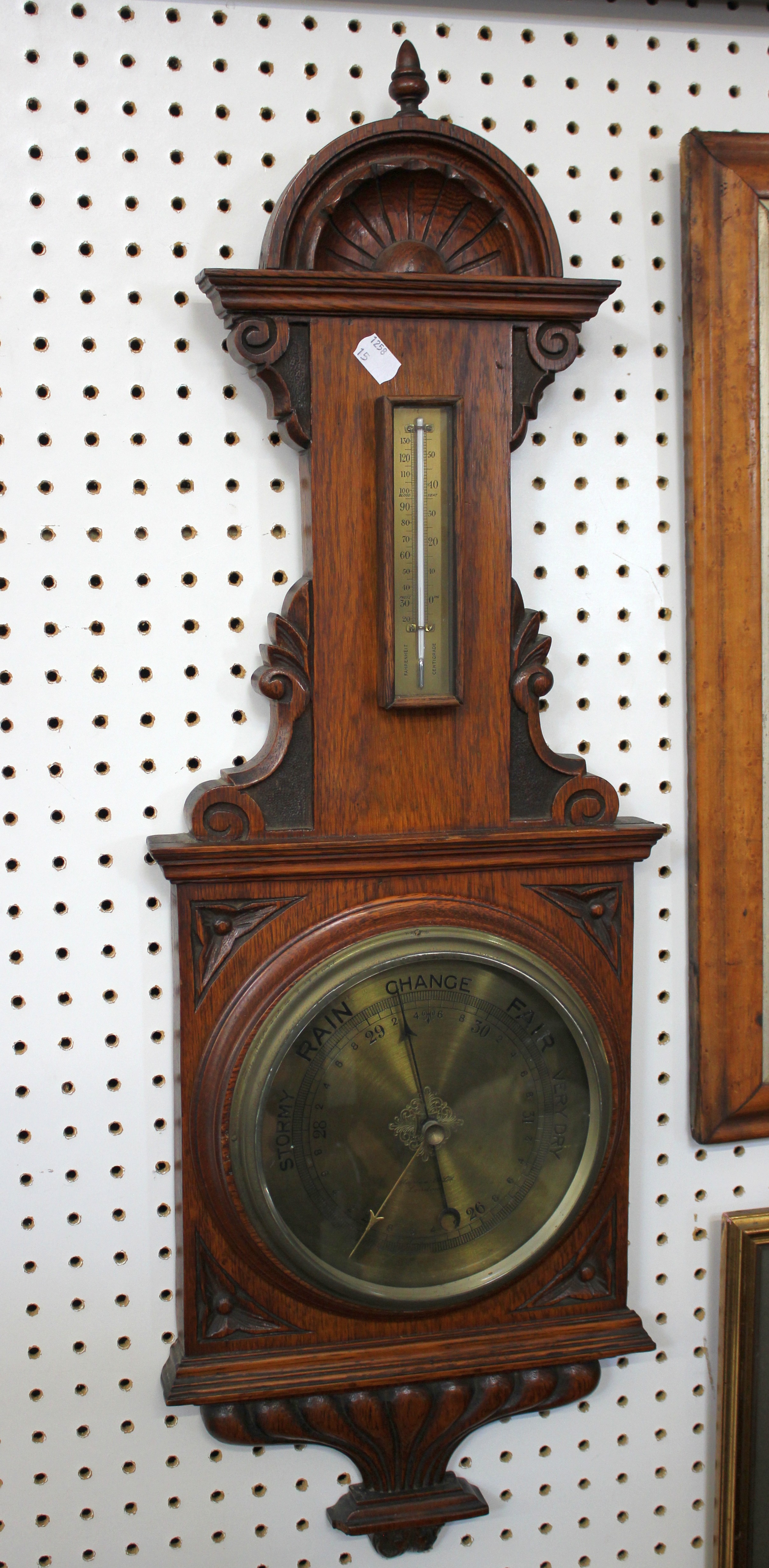 A 19th Century oak barometer and 19th Century rosewood writing slope