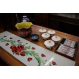 A French enamel panel of trailing red flowers, a Bretby jardinière, Japanese vase, a small Moorcroft