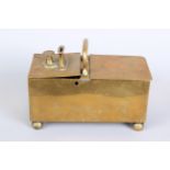 A 19th Century brass honesty box, the rectangular double lid revealing two compartments, one with