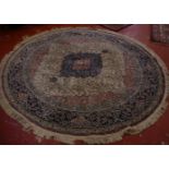 A Persian style circular rug diam. 190cm with two runners