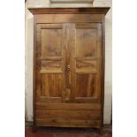 A French provincial chestnut armoire Circa 1900 246cm high, 170cm wide