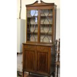 An Edwardian mahogany and crossbanded display cabinet 220cm high, 87cm wide