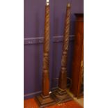 A pair of George III mahogany spiral twist standard lamps 172cm high (sold as parts