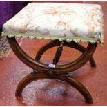 A Victorian walnut X frame stool