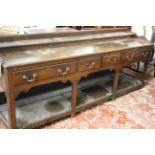 An 18th Century South Wales oak potboard dresser base with four drawers 85cm high, 210cm wide,