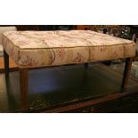 A large rectangular footstool, in George III style