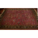 A Persian style rug 214cm x 295cm