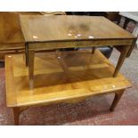 A Brigitte Forestiere cherrywood coffee table and another mahogany table