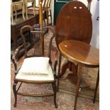 An Edwardian oval occasional table, standard lamp, Edwardian armchair and oval tilt top table