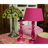 A pair of pink lamps and sunflower glass lamp