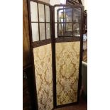 A three fold glazed Danish screen with blind fret detail and damask panels