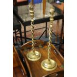 A pair of brass spiral candlesticks (converted to lamps, sold as parts) 59cm high