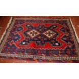 An Afshar rug 135 x 185cm