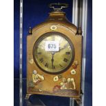 An Oriental decorated lacquered mantel clock, 24cm high including handle