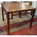 A Chinese elm square centre table 87cm high, 98cm wide