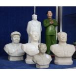 A Chinese Cultural Revolution statuette of Chairman Mao in green army uniform, and further busts and