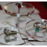 Seven Gemporia silver rings, to include Peridot, yellow sapphire, green diamond, Emeralds and rubies