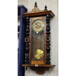 A 19th Century walnut Vienna wall clock