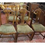 A set of six provincial George III dining chairs and a pair of George III mahogany side chairs