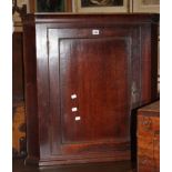 A George III oak corner cupboard and an oak two door cupboard