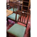 A set of seven 19th Century mahogany dining chairs to include one armchair each with vertical splats