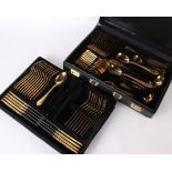 A case of Royal Collection Solingen gold plated flatware, twelve settings, lacking four main