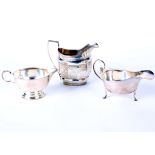 Silver: A George III cream jug, maker Charles Chesterman II, London 1801, a small jug hallmarked