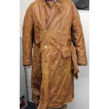 A gentleman's heavy leather coat with wool lining circa 1940's, the coat was issued by the