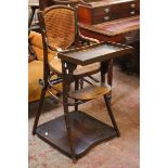 A Victorian bentwood and caned high chair bearing plaque 'Wedlake, Ashton & Co' and shelf