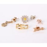 Five assorted modern 18ct gold and diamond earrings and another earring (6)