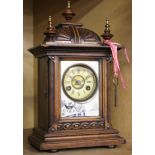 A Georgian style walnut cased bracket clock.