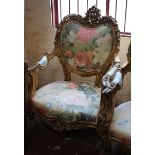 A pair of large gilt carved armchairs